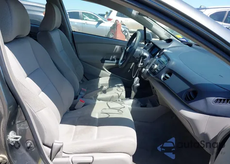 2010 Honda Insight Lx z USA, uszkodzony, nr VIN JHMZE2H58AS014625